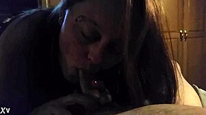 the slut wife takes on a blowjob for her daddy, sucking his cock eagerly in the scene