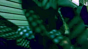 Skinny amateur stretches in leggings at night, creating intriguing lattice shadows on ass and legs during homemade workout.