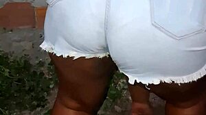 Hey, check out my big-ass neighbor cleaning the yard - isn't that huge ebony booty just amazing in this homemade clip?