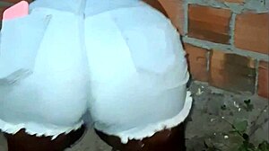 Hey, check out my big-ass neighbor cleaning the yard - isn't that huge ebony booty just amazing in this homemade clip?
