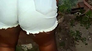 Hey, check out my big-ass neighbor cleaning the yard - isn't that huge ebony booty just amazing in this homemade clip?