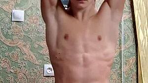 Skinny flexible boy shows off muscular body after study session