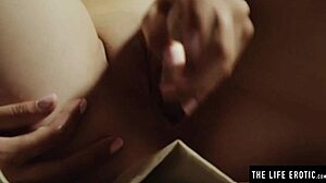 hey, she's muffling her screams with a ballgag while dildoing that wet pussy in bound bondage play... intense clit action! 😈