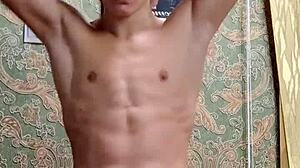 Skinny flexible boy shows off muscular body after study session