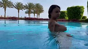 i'm monika fox swimming naked in the pool and sea of this hot country with my fake tits free