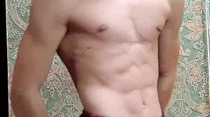 Skinny flexible boy shows off muscular body after study session