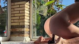 Am I really struggling to fit this huge black dildo into my tight pussy during backstage play?