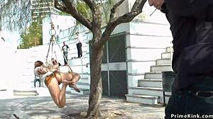 Euro slave gets bound and dominated in bondage. She is walked naked through public outdoor spaces.