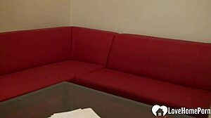 black-haired babe oils up for solo session on sofa