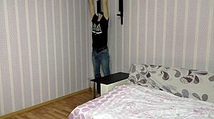 Little stepson assists stepmom with early morning fitness routine including athletic exercises