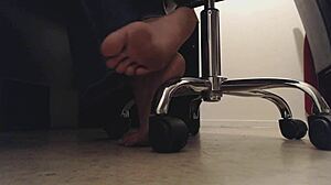 Foot voyeur sneaks peeks at tall mistress's dirty soles and crunching toes underdesk.