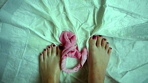 perfect pink pussy girl gets kinky wetting panties with lots of peeing