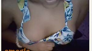 Tetona displays her big tits and boobs on webcam for viewers.