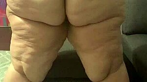 Large Curvy Woman Displays Her Prominent Backside