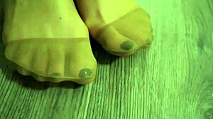 Girl plays with balloons while wearing pantyhose, big tits bouncing.