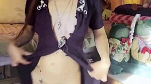 brunette beauty strips slowly in stockings for solo tease