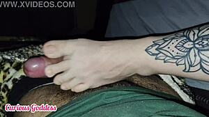 Hey, I crashed at my friend's place and his wife spotted my hard dick, then gave me an epic footjob