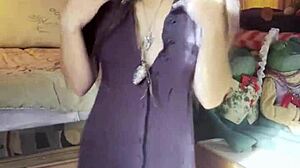 brunette beauty strips slowly in stockings for solo tease