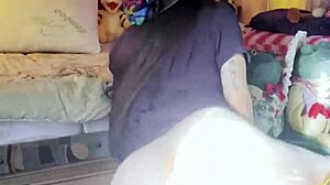 brunette beauty strips slowly in stockings for solo tease