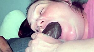 How does this big mouth handle choking on a thick black cock down her throat?