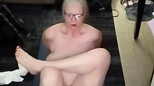 a mature woman begins her day with relaxing yoga