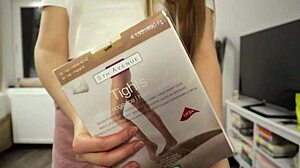 Girl plays with balloons while wearing pantyhose, big tits bouncing.