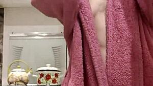 so this raven-haired petite chick is rubbing and fucking her shaved tight pussy with toys in the kitchen