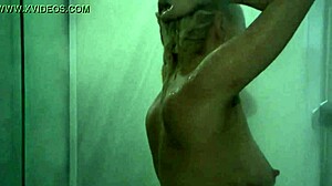i'm this sexy blonde girl with hairy bush and big tits getting nude in the panic shower scene