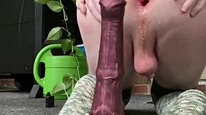 Bouncing wildly on huge horse dildo with anal gaping
