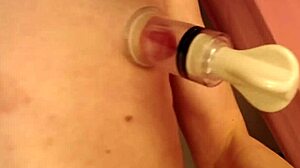 skinny blonde sucks giant beehive dildo with huge nipple suckers