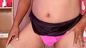 dancing sexy in pink shiny thong nylons and bra