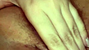 bold closeup of dripping hairy pussy exposed