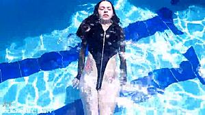 Latex-Clad Jessica Bunny Dives Underwater in Pool