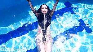 Latex-Clad Jessica Bunny Dives Underwater in Pool