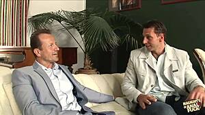 Two guys stretch her pussy and ass with huge cocks