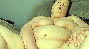 bbw becca strips naked and rams dildo deep in fat pussy