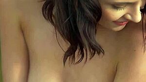 Sensual shaved babe teases pussy close-up on sunny beach