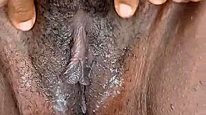 watch this ebony stepmom rub her wet hairy pussy clit to orgasm