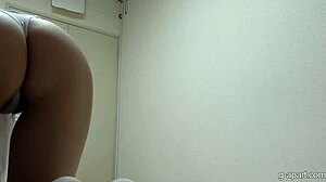 Japanese maid cleans braless in micro thong showing cameltoe upskirt legs