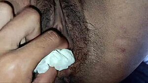 Her tight shaved pussy gushes soaking her swollen clit