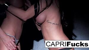 two gorgeous busty brunettes and blondes fuck each other wildly with strap-on passion