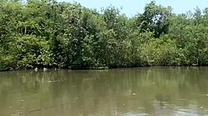 Exhibitionist flashes tiny shorts while fishing outdoors