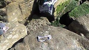 African beach prostitute shows off her good shaking ass!