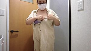 A married Japanese bride pleasures herself with intense standing masturbation