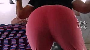 Chubby ebony babe squats big ass at the gym