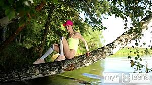 adorable skinny teen fingers shaved pussy outdoors to orgasm