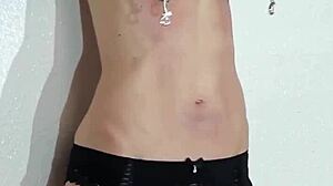 submissive redhead bound to machine squirts from rough whipping clamps