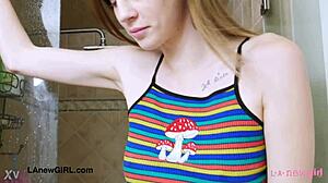 Tall brunette model strips down for steamy shower.