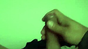 hot latina jerks huge cock moaning to explosive orgasm