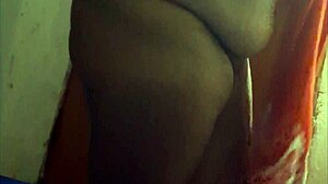 Ebony babe steps from shower with wet pussy